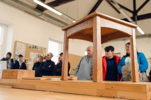 Table with students in the background