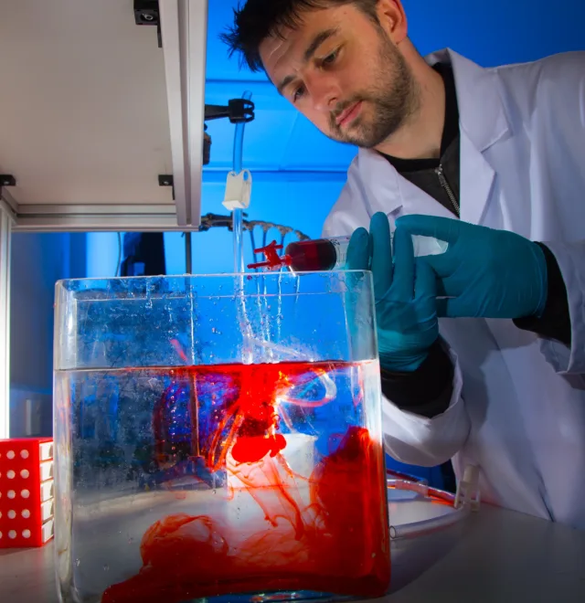 Male medical researcher working in lab