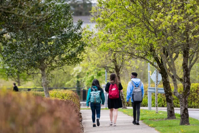 A group of students walking together on campus