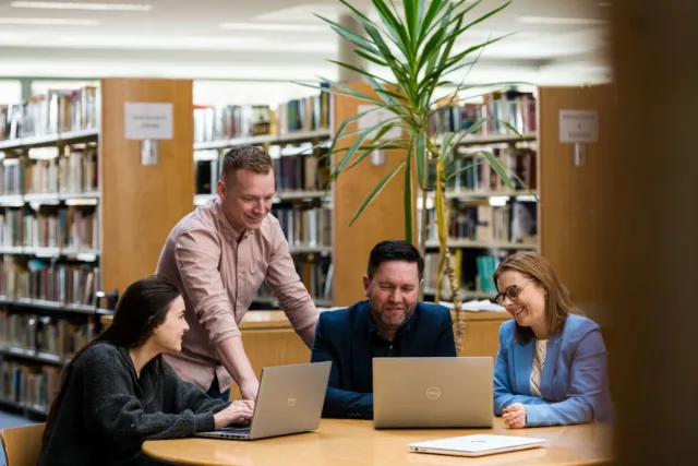 Students working in the library