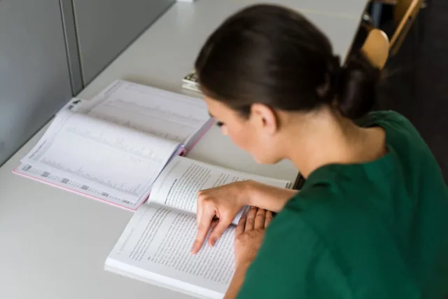 Student nurse in library