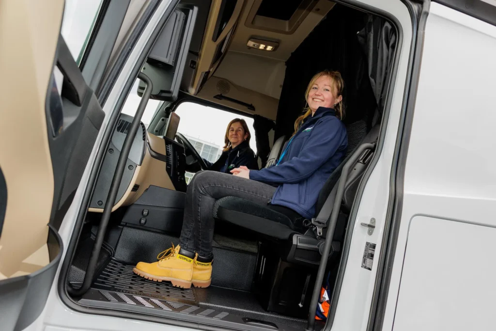 Apprenticeship pictured in a lorry cab.