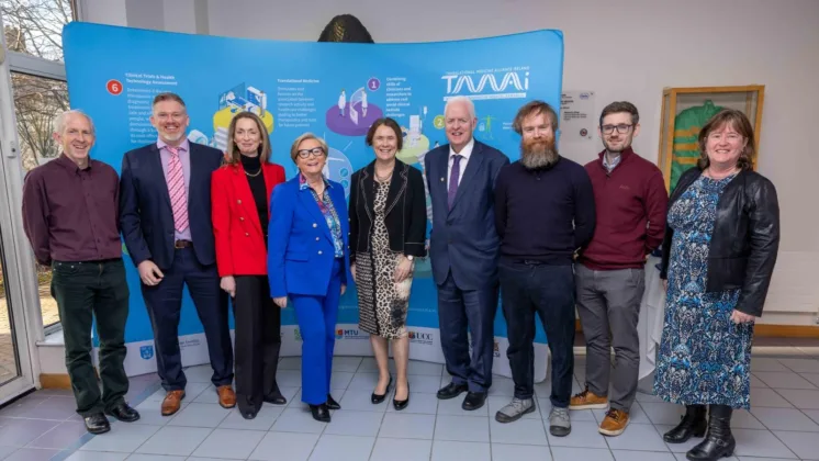 Members of The Translational Medicine Alliance Ireland (TMAI) pose together, smiling for the camera.