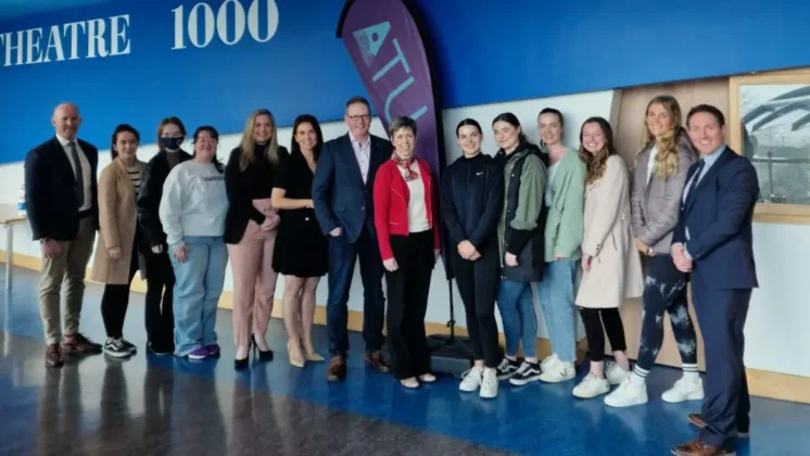 Students, ATU Staff and stakeholders from Galway Race smile for a photo.