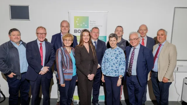 Group of ATU staff and guests smiling for a photo at the Border Region Manufacturing Cluster (BORMAC) event.