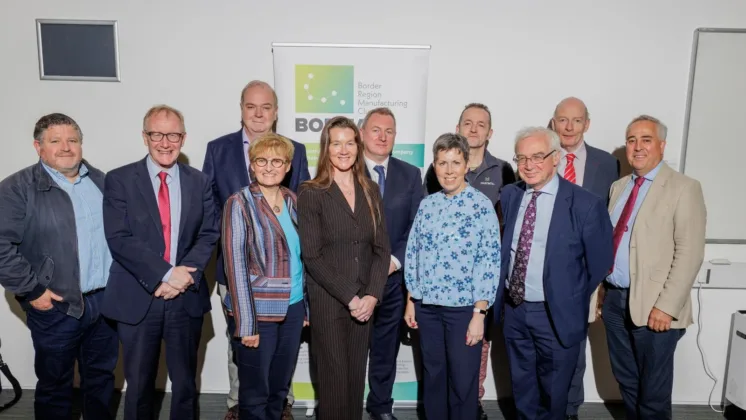 Group of ATU staff and guests smiling for a photo at the Border Region Manufacturing Cluster (BORMAC) event.