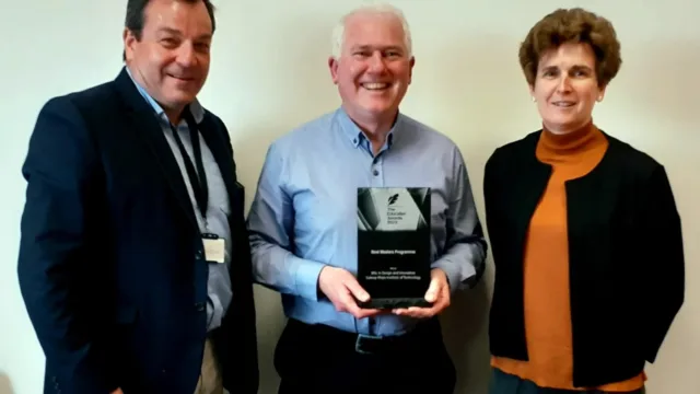 Dr Martin Taggart, lecturer, Dr Gabriel J Costello, Chair of the Master in Design and Innovation programme and lecturer, holding the 'Best Master Programme' award and Emer Cahill, lecturer ATU Galway.