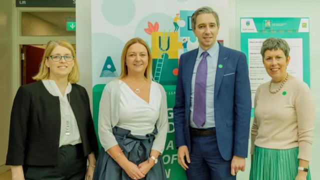 ATU staff members alongside, Minister Simon Harris, TD and ATU President Dr Orla Flynn