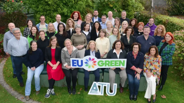 Group of people outside promoting EU Alliance retreat