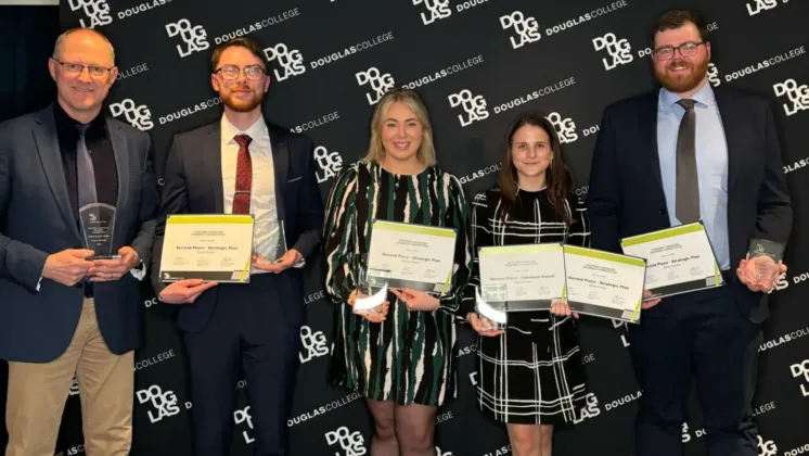 ATU Business students post with awards and certificate