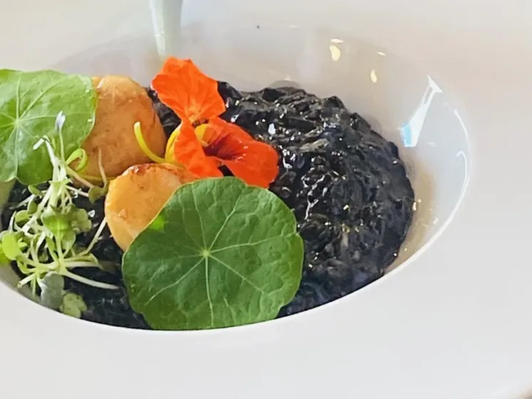 Plate of food decorated with flowers