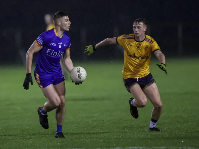 Two player playing gaelic football