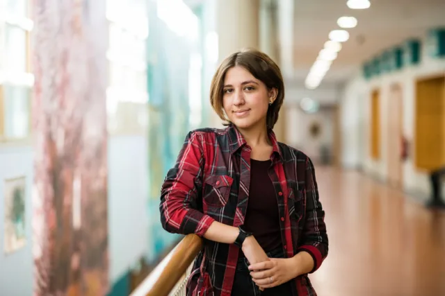 Female International Student stands in hallway on the Letterkenny campus