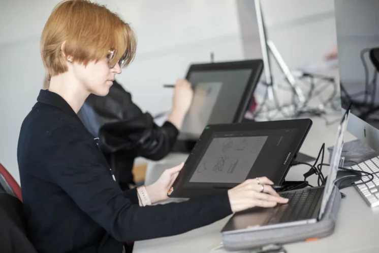 student working on computer