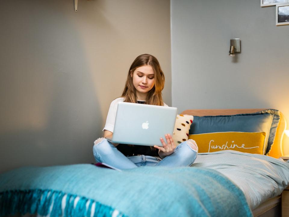 Studying in bedroom of student accommodation