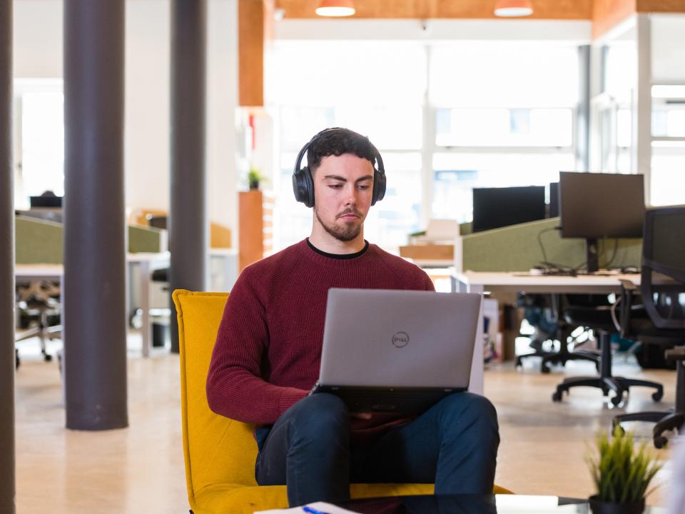 Male student on laptop