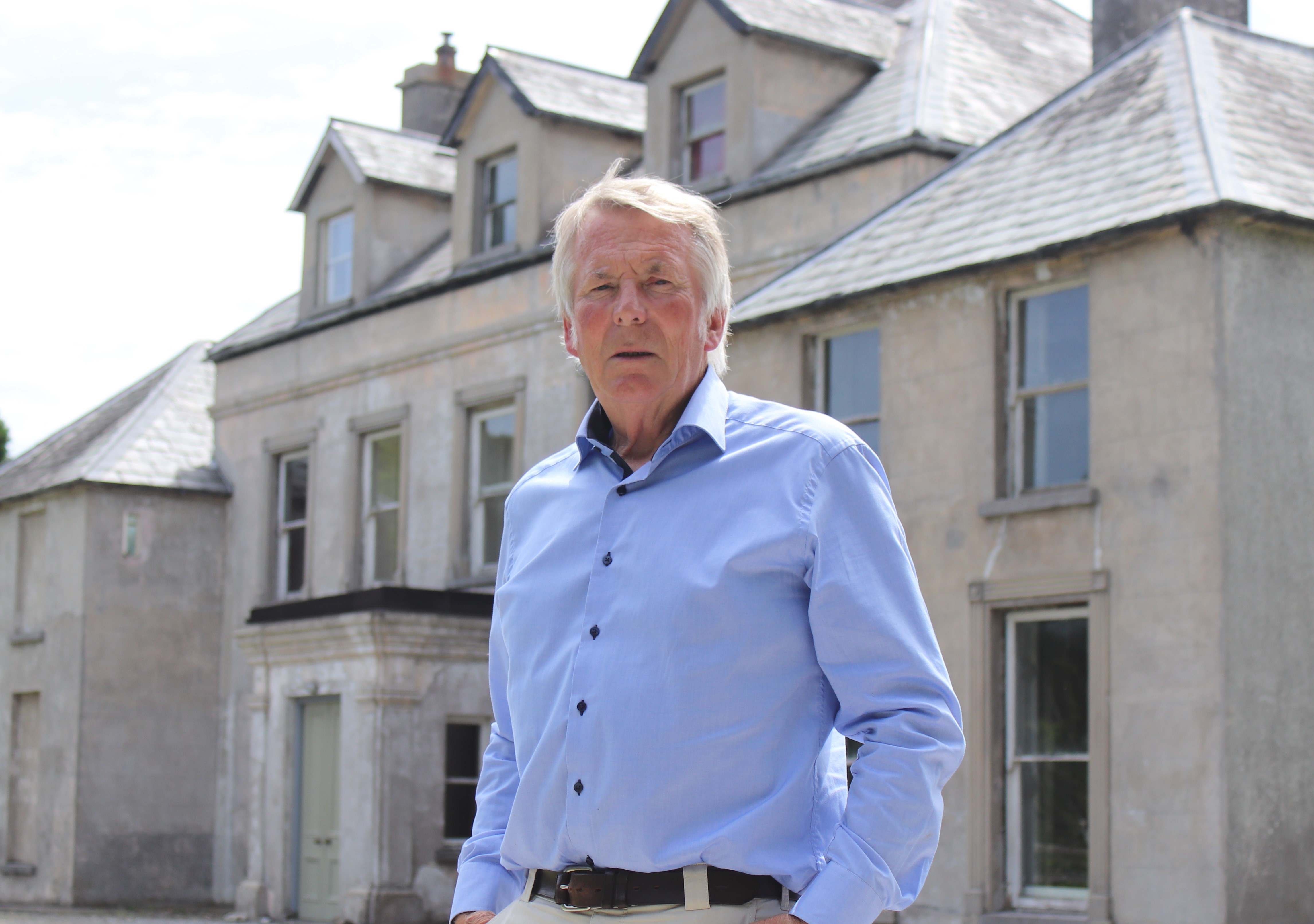 Veterinary surgeon Donal Connolly, one of the three founding members of the Aleen Cust Memorial Society, pictured in front of Cordangan Manor where Aleen Cust was born in 1868 